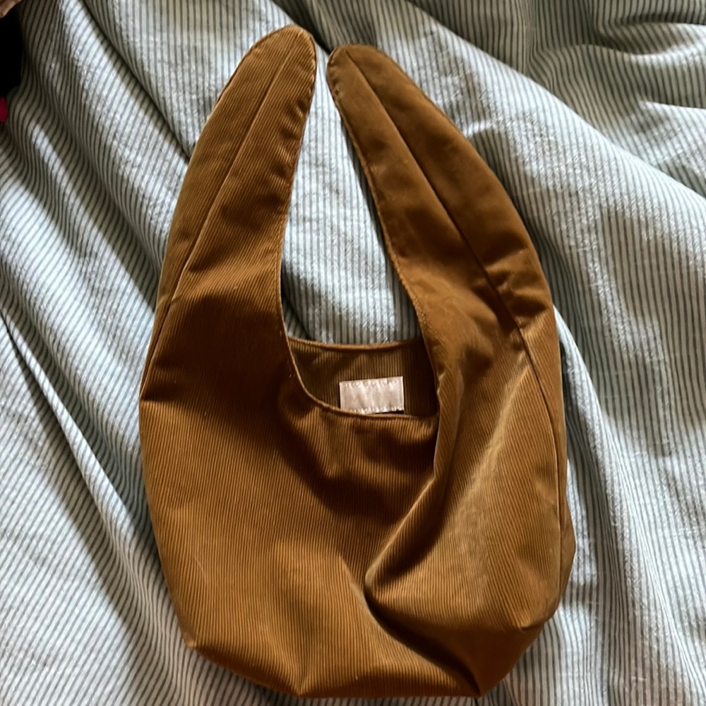 Merit beauty clutch